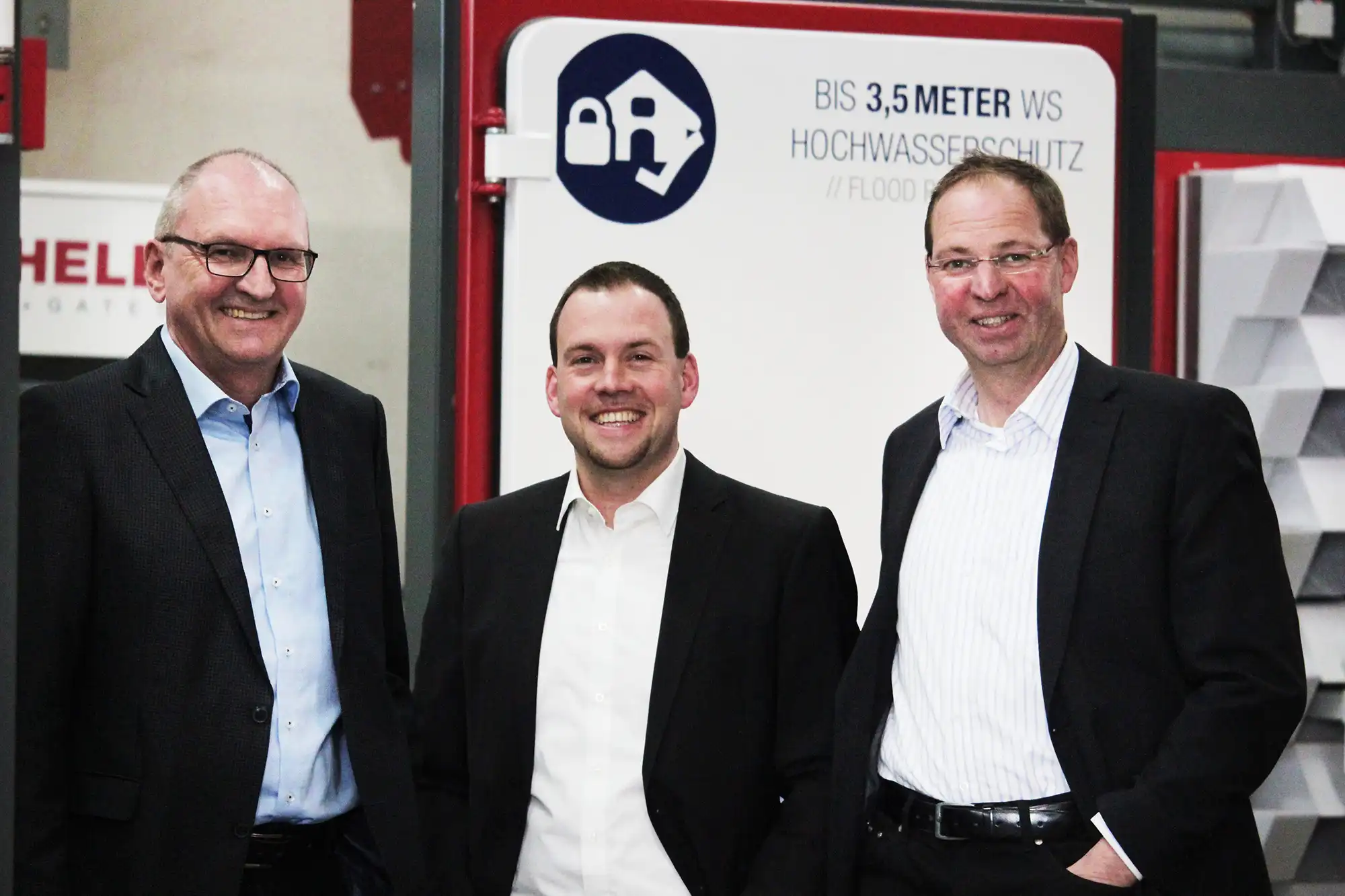 Die Geschäftsführer Jürgen, Andreas und Ralf Buchele vor einem BUCHELE-Messestand