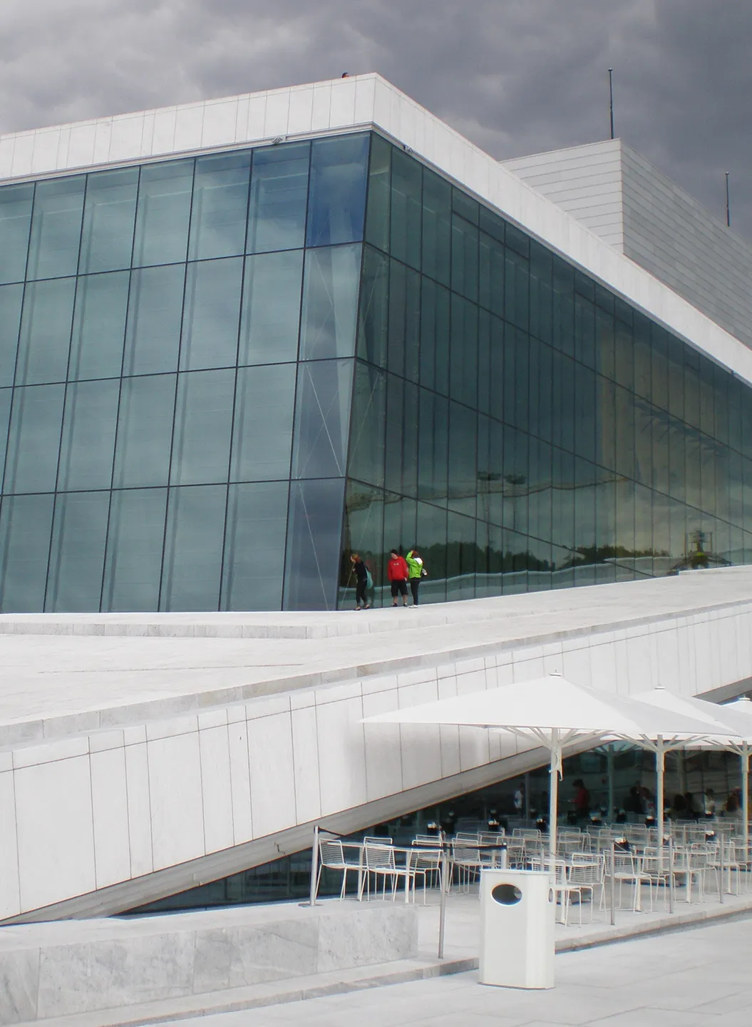 Glass facade and marble forecourt of the Oslo Opera House